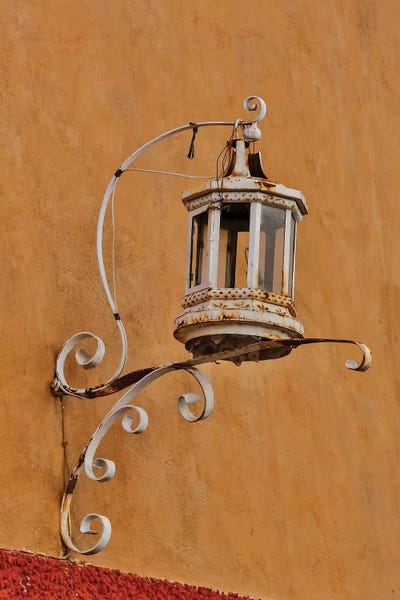 San Miguel de Allende: San Miguel De Allende, Mexico. Lantern and shadow on colorful buildings by Darrell Gulin