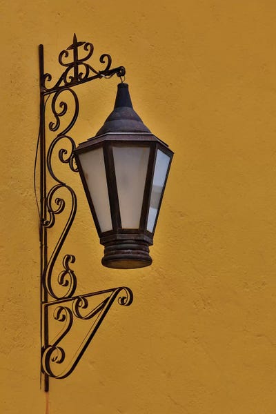 San Miguel de Allende: San Miguel De Allende, Mexico. Lantern and shadow on colorful buildings by Darrell Gulin