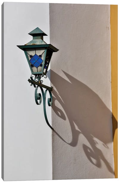 San Miguel De Allende, Mexico. Lantern and shadow on colorful buildings Canvas Art Print - Darrell Gulin
