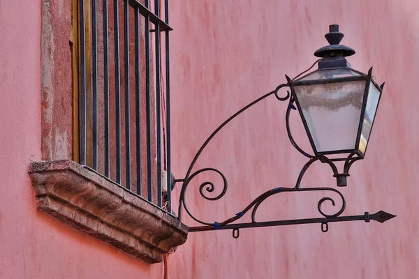 San Miguel de Allende: San Miguel De Allende, Mexico. Lantern and shadow on colorful buildings by Darrell Gulin