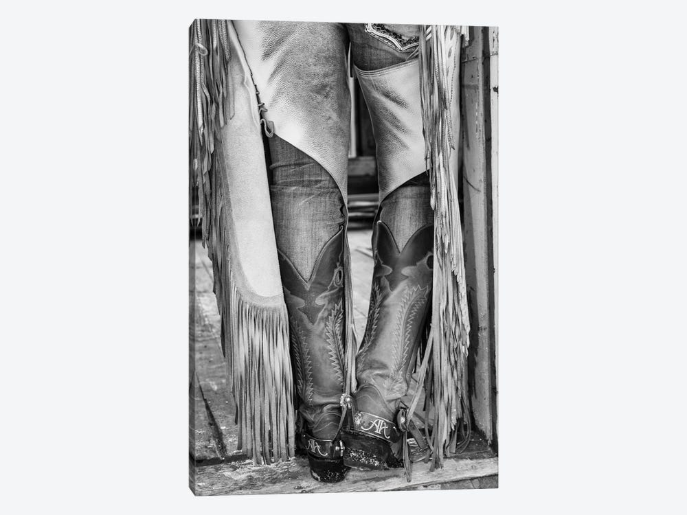 Horse drive in winter on Hideout Ranch, Shell, Wyoming. Cowgirl detail of boots and chaps in doorway of log cabin. by Darrell Gulin 1-piece Canvas Wall Art