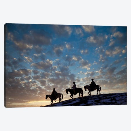 USA, Shell, Wyoming Hideout Ranch Cowboys And Cowgirls Silhouetted Against Sunset Riding On Ridgeline I Canvas Print #DGU176} by Darrell Gulin Canvas Art Print