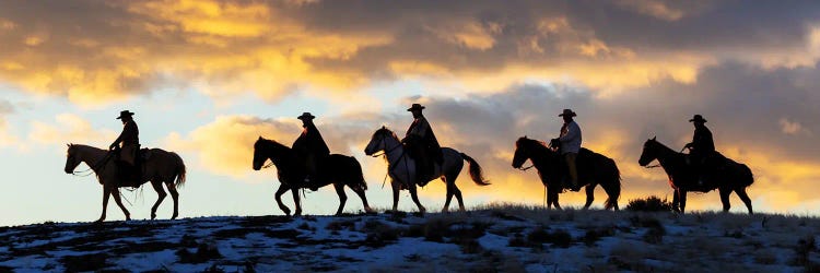 USA, Shell, Wyoming Hideout Ranch Cowboys And Cowgirls Silhouetted Against Sunset Riding On Ridgeline II