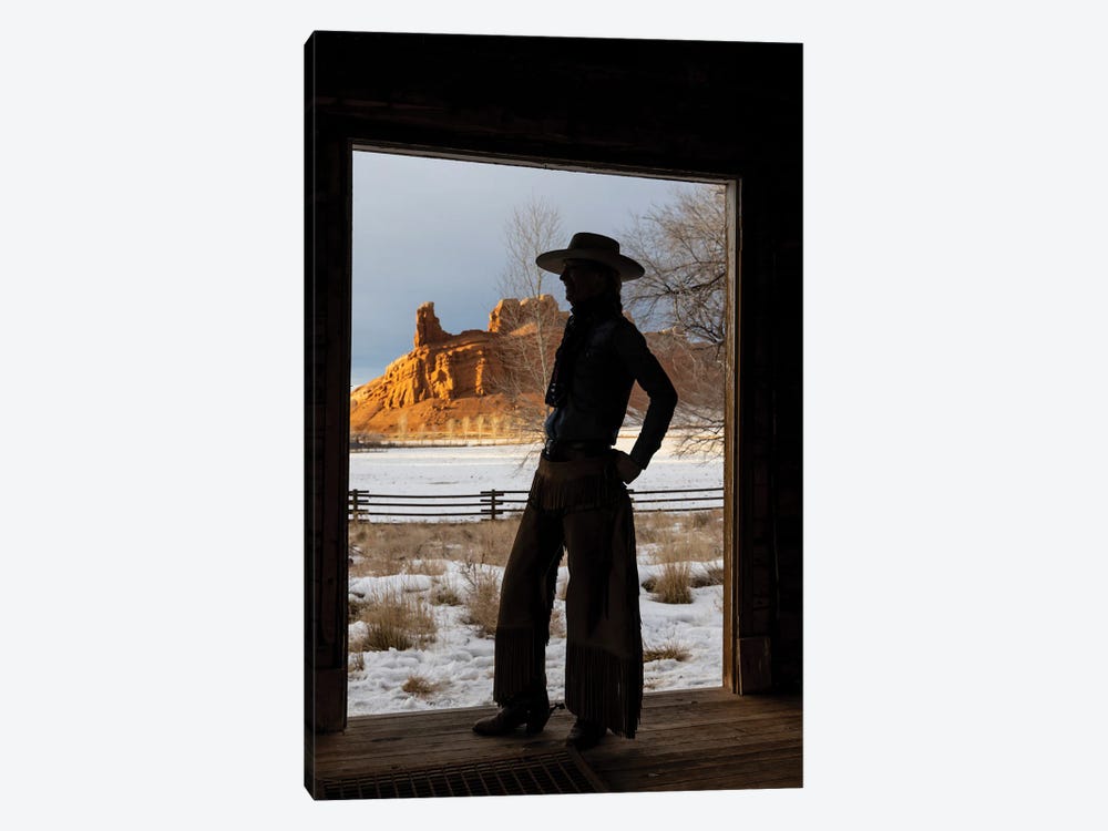 USA, Shell, Wyoming Hideout Ranch With Cowgirl Silhouetted In Doorway Of Log Cabin by Darrell Gulin 1-piece Canvas Art