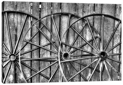 Wooden fence and old wagon wheels, Charleston, South Carolina Canvas Art Print - Darrell Gulin
