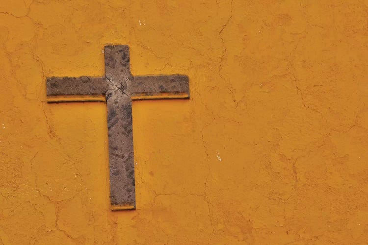 San Miguel De Allende, Mexico. Cross mounted on buildings wall