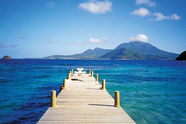 Docks & Piers: View Of Booby Island And Nevis As Seen From The Pier At Turtle Beach, Saint Kitts by David Herbig