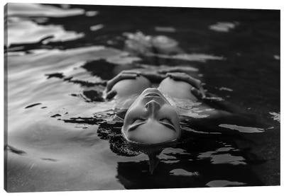Black And White Photo Of Woman Posing With Closed Eyes While Lying In The Water Canvas Art Print