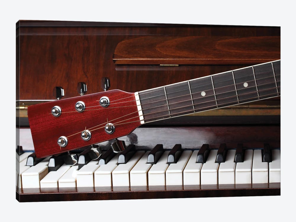 Guitar Neck On Old Piano Keys by flowerstock 1-piece Canvas Print
