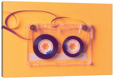 Reel Music Tapes On A Yellow Background Canvas Art Print - Music Collection