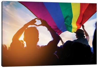 Pride Community At A Parade Raising An LGBT Flag Canvas Art Print