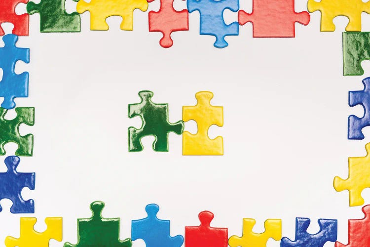 Top View Of Multicolored Puzzle Pieces On A White Background