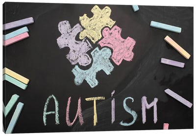 Autism And Puzzle Pieces Drawn On A Chalkboard Canvas Art Print