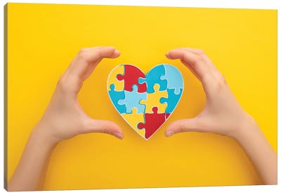 World Autism Awareness Day - Female Hands Around A Heart Puzzle Symbol Canvas Art Print - Neurodiversity
