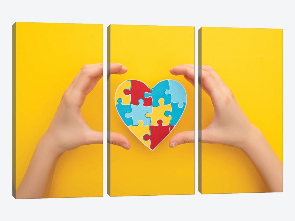 World Autism Awareness Day - Female Hands Around A Heart Puzzle Symbol by VadimVasenin 3-piece Canvas Artwork