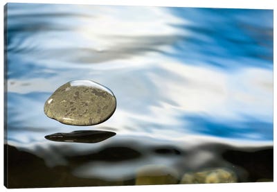 Skipping Stone Just About To Hit The Water's Surface Canvas Art Print