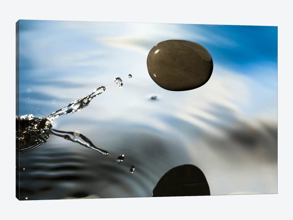 A Rock Skipping Across The Water's Surface by Michael Durham 1-piece Canvas Art Print