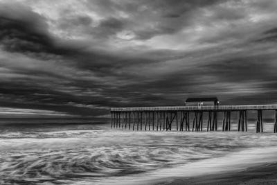 Fishing Pier Storm by David Gardiner framed canvas print