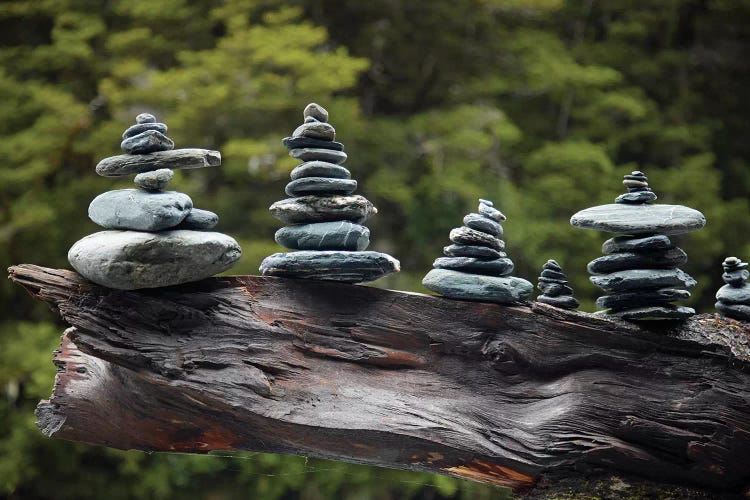 Rock stacks made by tourists by Fantail Falls, Haast Pass, Mt. Aspiring NP, New Zealand