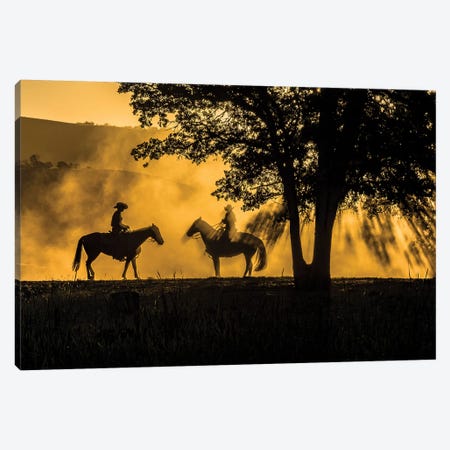 USA, California, Parkfield, V6 Ranch silhouette of two riders on horseback. Early dusty morning.  Canvas Print #ECL5} by Ellen Clark Canvas Art Print
