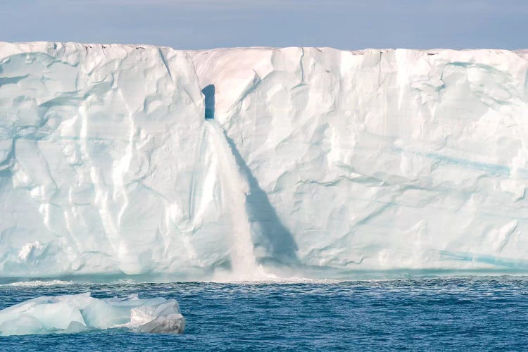 Svalbard, Nordaustlandet Island. Waterfalls Cascade From The Melting Glacier.