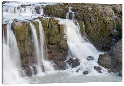 Iceland, Gygjarfoss waterfall. This small waterfall flows through a rather barren landscape. Canvas Art Print