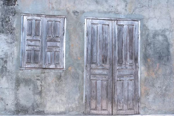 Madagascar: Africa, Madagascar, Fort Dauphin, Tolanaro Marketplace. A Shuttered Home Showing The Muted Colors Of Weathered Wood. by Ellen Goff