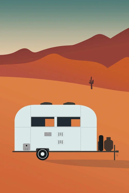 Camper In The Desert At Sunset