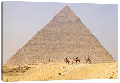 Giza, Cairo, Egypt. Men On Camels At The Great Pyramid Complex. Canvas Art Print