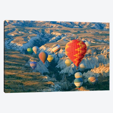 Turkey, Anatolia, Cappadocia, Goreme. Hot air balloons above Red Valley II Canvas Print #EWI11} by Emily Wilson Canvas Print