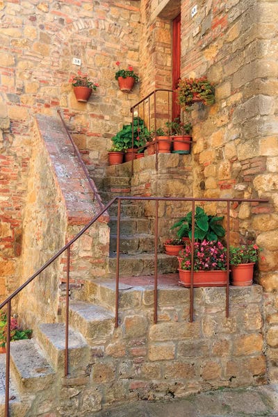 Staircases: Italy, Val d'Orcia in Tuscany, province of Siena, Monticchiello. Stairs with potted flowers. by Emily Wilson