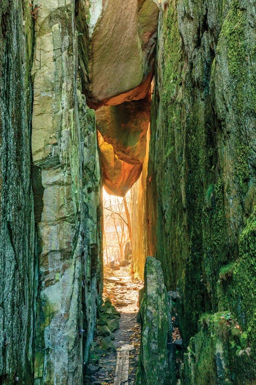 Sweden, Bohuslan Province. Path through wedged rocks near Uddevalla.