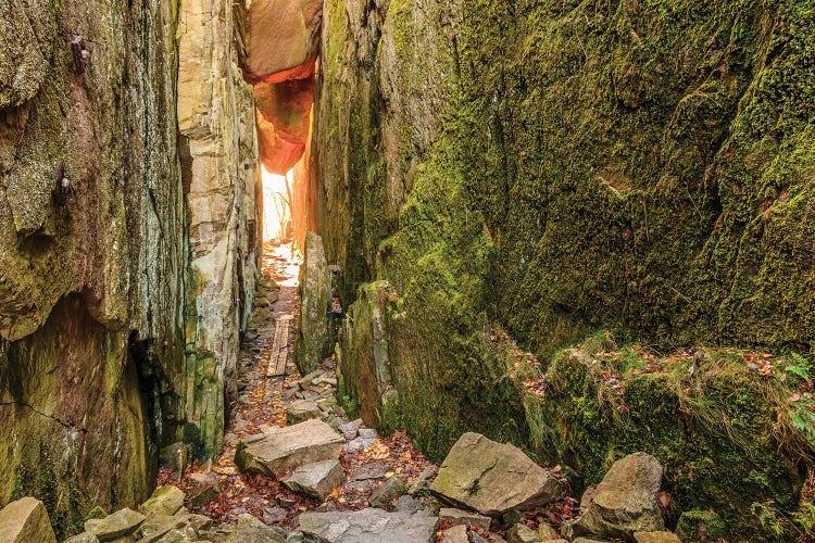 Sweden, Bohuslan Province. Path through wedged rocks near Uddevalla.