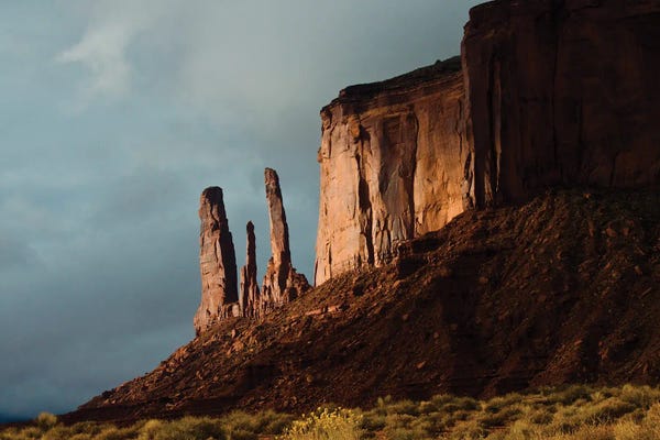 Monument Valley: USA, Arizona- Utah, Goulding's, Navajo Tribal Park, Monument Valley, Three Sisters and Mitchell Mesa by Bernard Friel