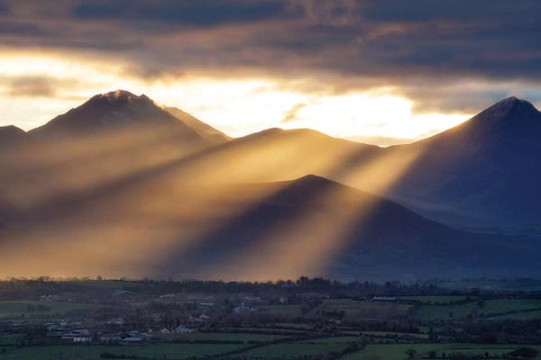 Kerry: Crepuscular Rays, Macgillycuddy's Reeks, County Kerry, Munster Province, Republic Of Ireland by Gareth McCormack