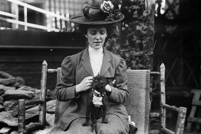 Woman And Dog, C1900 by Unknown framed wall art