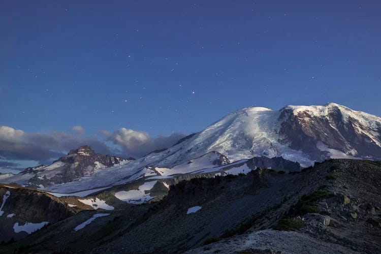 WA. Twilight shot of stars over Mt. Rainier, Little Tahoma and Burroughs Mountain