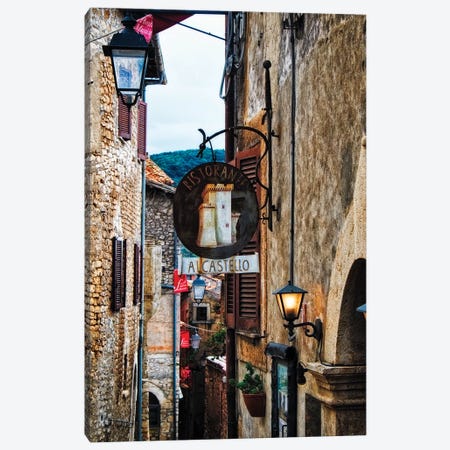 Narrow Medieval Street With Signs And Lamps, Sermoneta, Italy Canvas Print #GOZ268} by George Oze Art Print