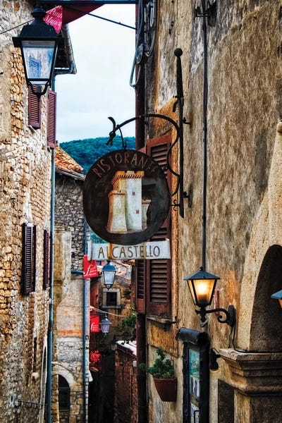 Narrow Medieval Street With Signs And Lamps, Sermoneta, Italy