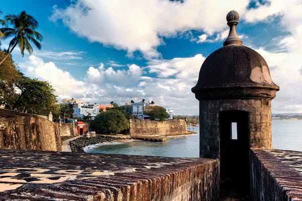 Puerto Rico: View Of The Walls Of Old San Juan With A Sentry Box In The Foreground, Puerto Rico by George Oze