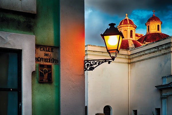 Puerto Rico: Old San Juan Street Corner With A Cathedral by George Oze