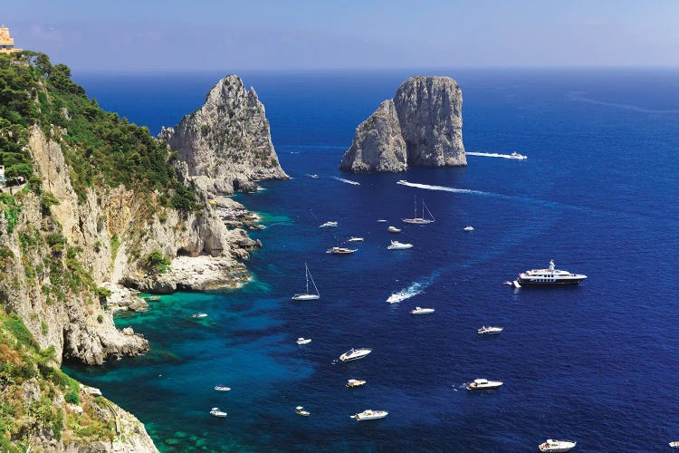 Capri Coastline At The Rocks Of Faraglioni, Campania, Italy