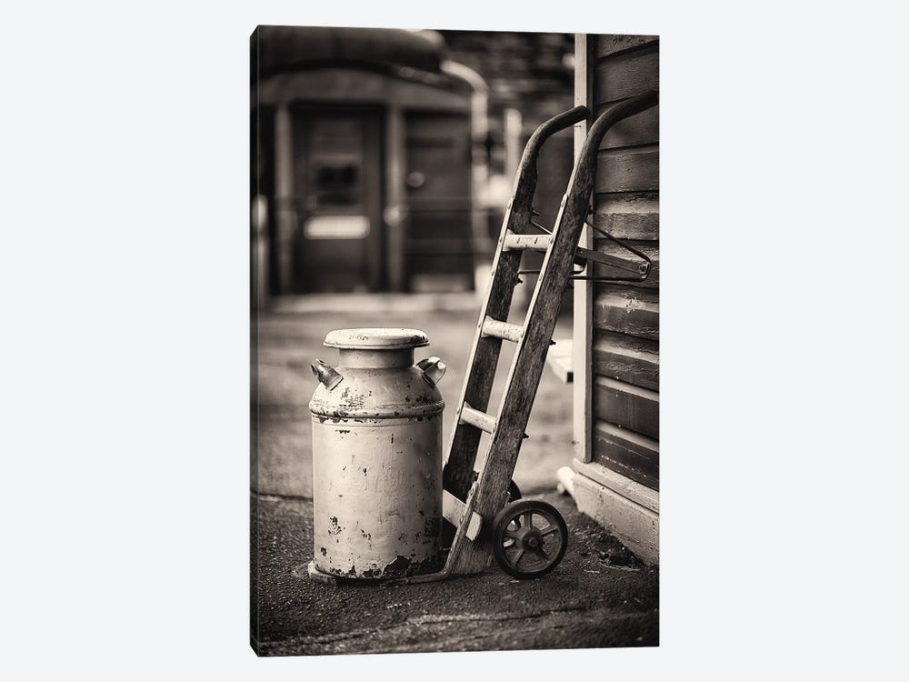 Old Milk Can With A Hand Barrows At A Train Station by George Oze 1-piece Canvas Art Print