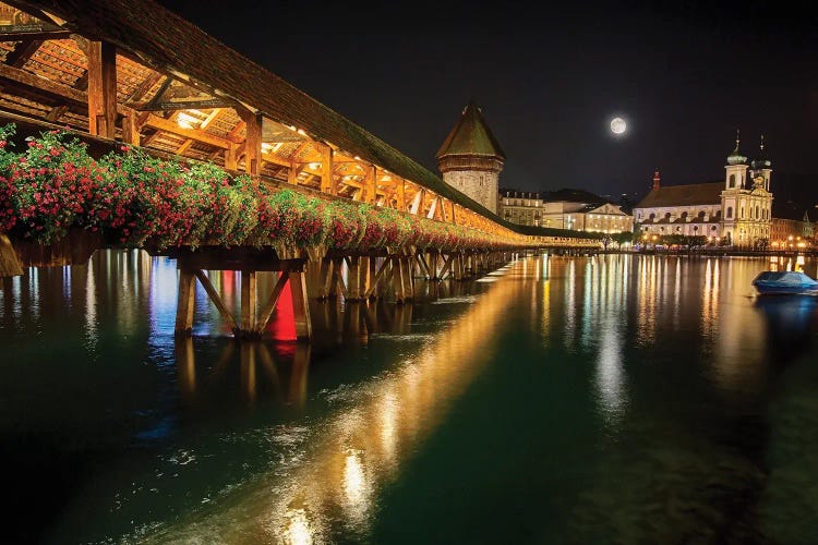 Scenic Night View Of The Chapel Bridge In Old Town Lucerne, Switzerland