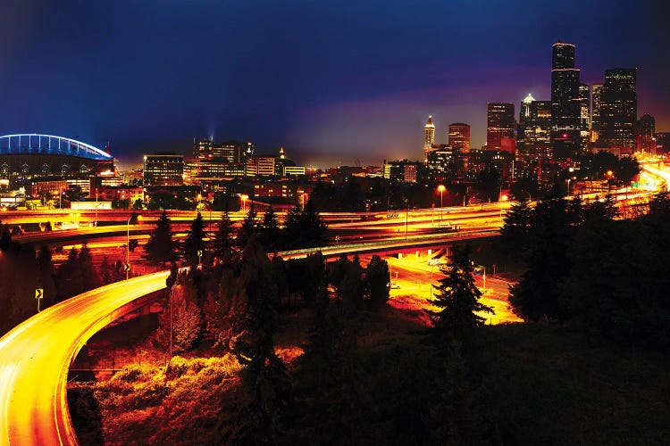 Seattle At Night With Freeways Passing Through