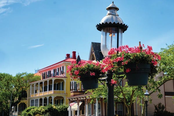 George Oze: Gas Lamp With Red Potted Flowers On A Street, Cape May, New Jersey by George Oze