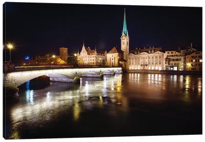 Nighttime View Of The Fraumunster Abbey With The Munster Bridge, Zurich, Switzerland Canvas Art Print - Zurich Art