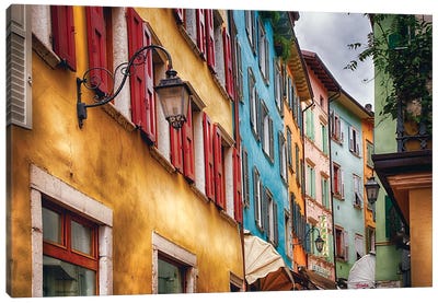 Low Angle View Of Colorful House Facades, Riva Del Garda, Lombardy, Italy Canvas Art Print - George Oze