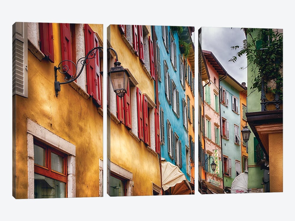 Low Angle View Of Colorful House Facades, Riva Del Garda, Lombardy, Italy by George Oze 3-piece Art Print