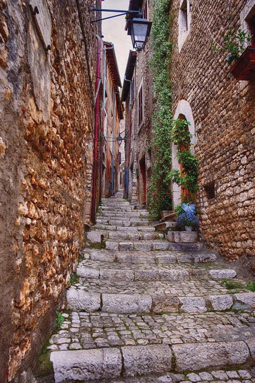 Narrow Cobblestone Alley In A Medieval Town With A Cheese Shop, Sermoneta, Latina, Italy